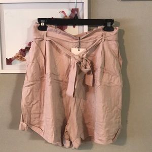 Blush colored high waste cuffed linen shorts